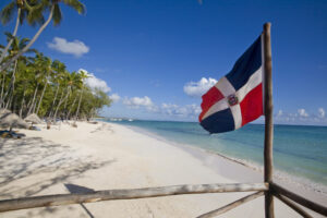 Dominican republic flag in the beach