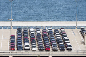 Vehicles waiting for transport at the customs car park in Portvell of Barcelona, Spain